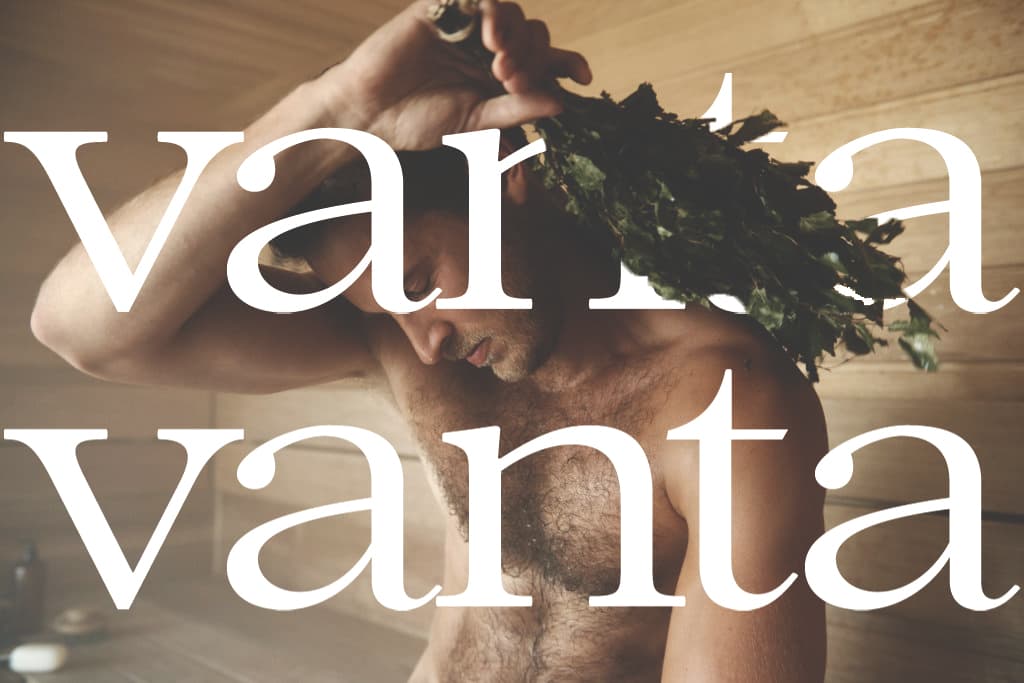 Man in a sauna holding a vanta whisk